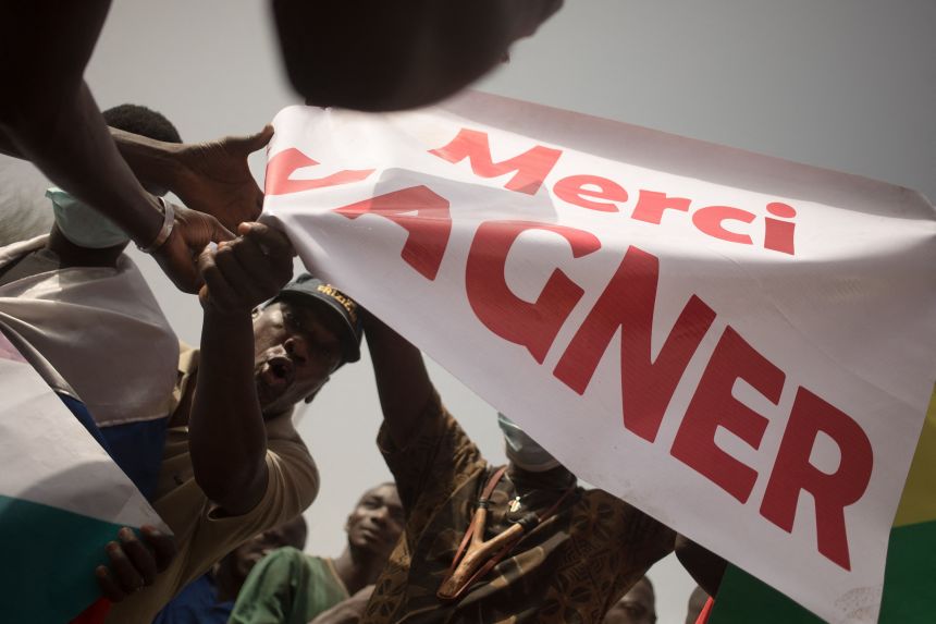 Protesters hold a banner reading "Thank you Wagner" during a demonstration organized to celebrate France's announcement it would withdraw French troops from Mali, in February 2022.