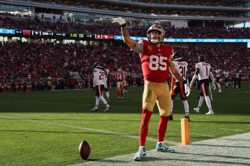 George Kittle #85 of the San Francisco 49ers reacts after a first down during the second quarter against the Chicago Bears at Levi's Stadium on December 8.