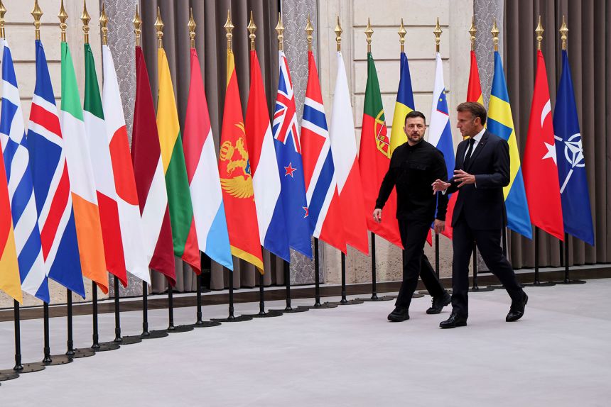 Ukraine's President Volodymyr Zelenskyy, left, and French President Emmanuel Macron, arrive to attend a summit on Ukraine at the Elysee Palace, in Paris, France, on Thursday, September 4.
